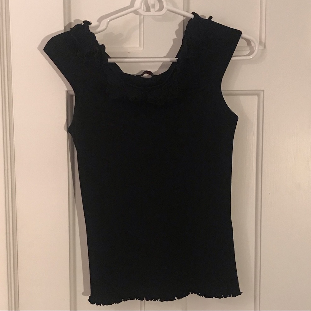 Beautiful, black top with ruffle details.